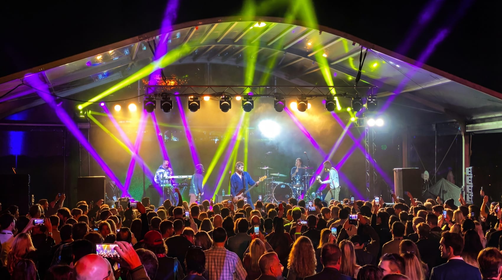 Live concert stage with intelligent lighting and line arrays