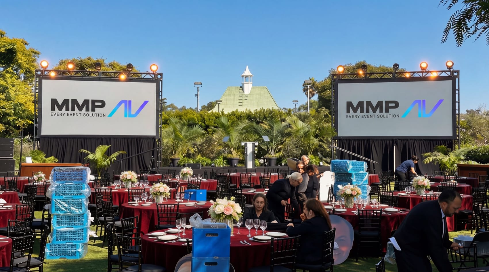 Outdoor corporate event AV setup with projection screens