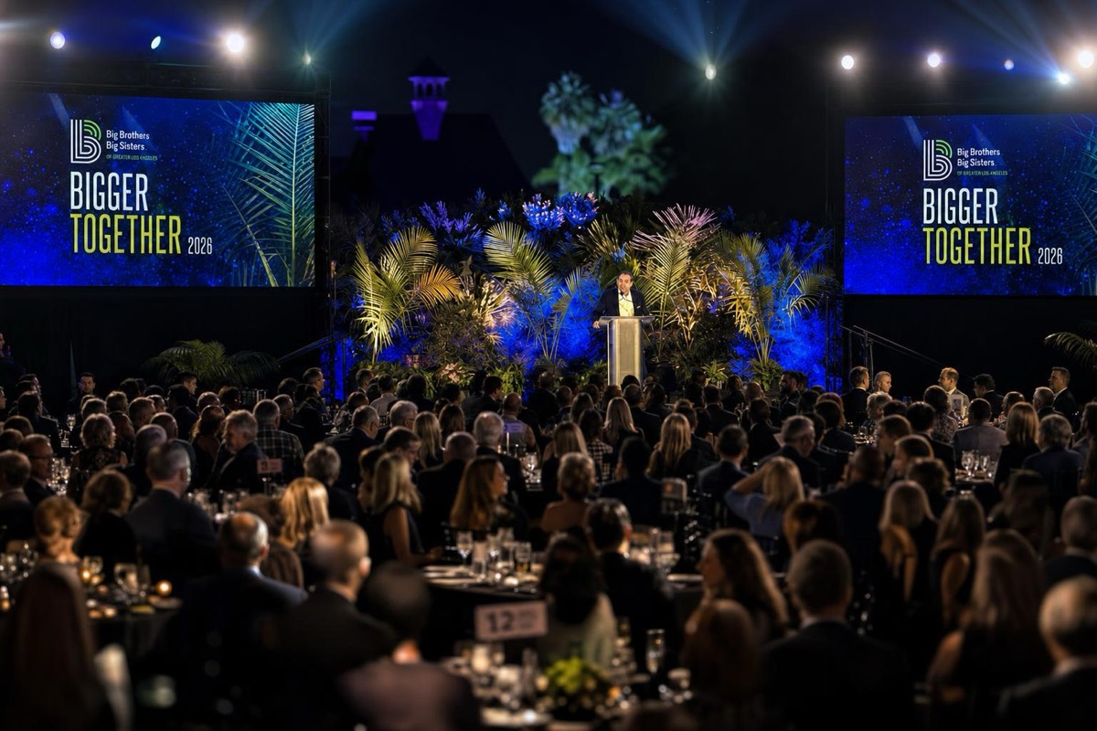 Cinematic brand video capture of a corporate event on a lit stage