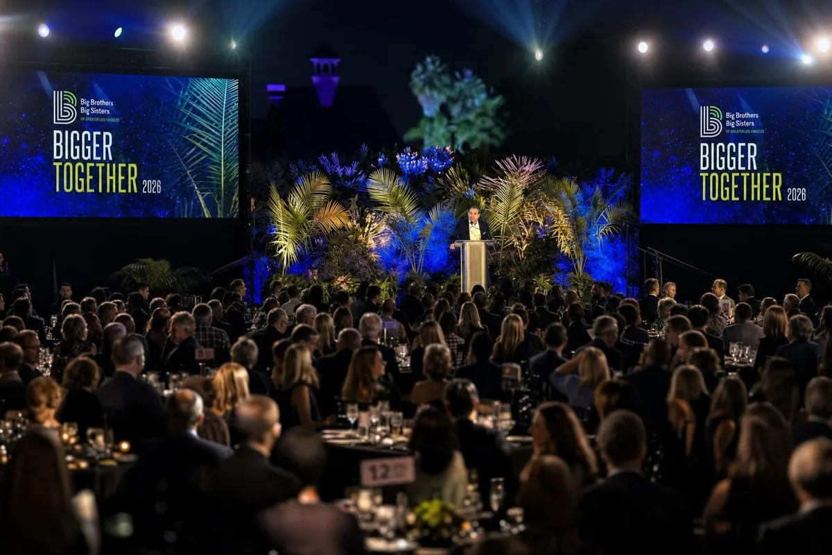 Cinematic brand video capture of a corporate event on a lit stage